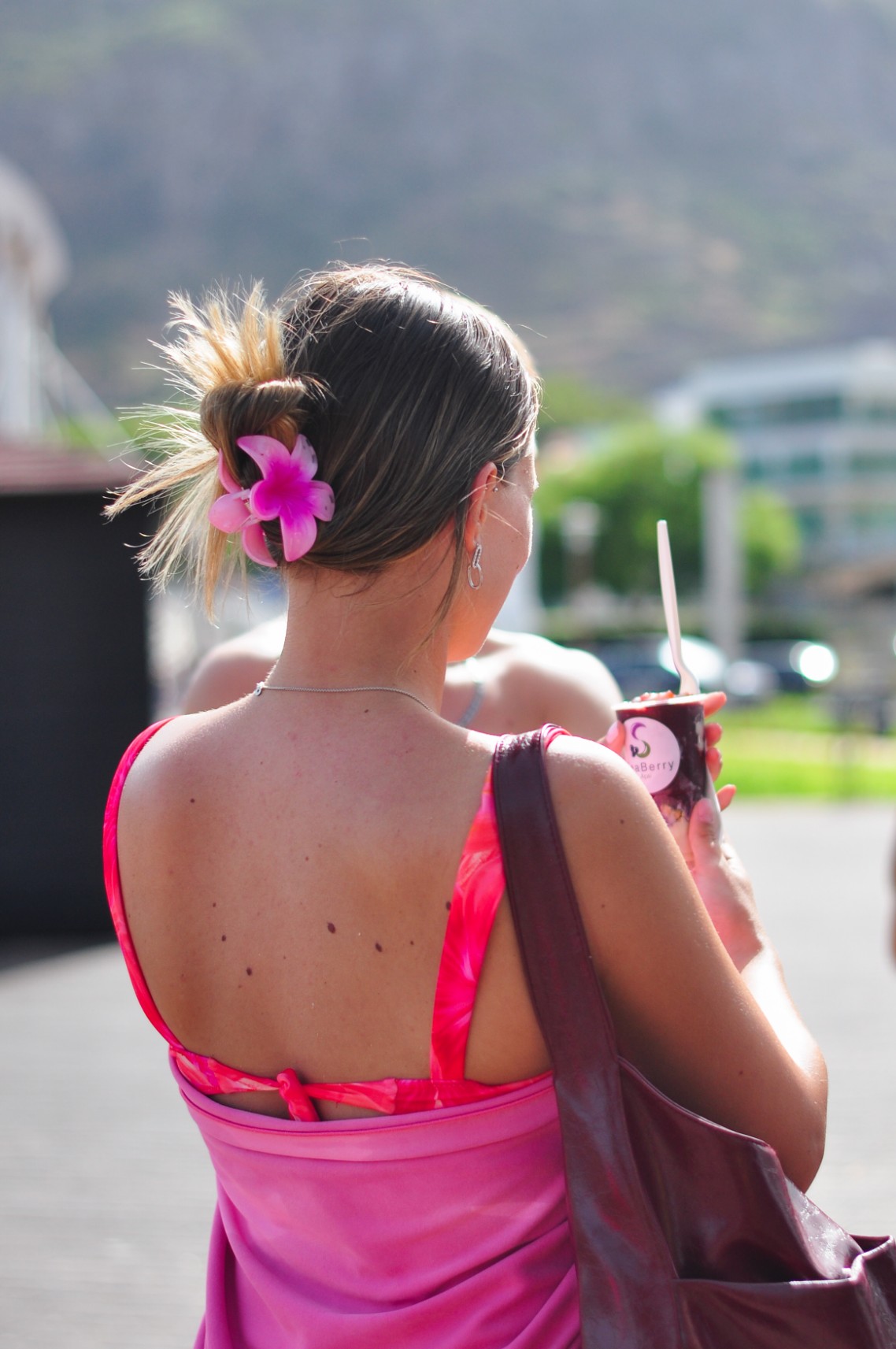Customers enjoying fresh açaí on Machico beach, Madeira